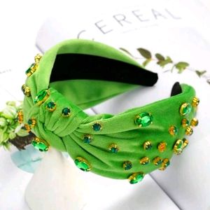Green headband with stones, knot design